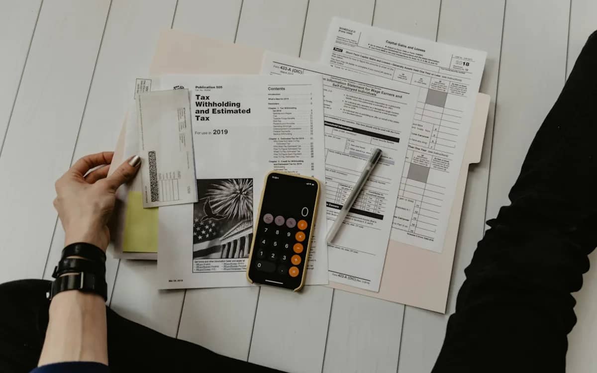 Identity and address documents laid out for a company filing